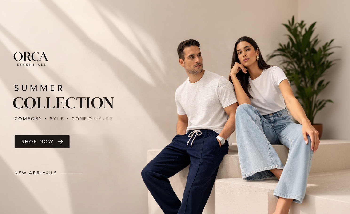 Two people sitting on a bench wearing white t-shirts and blue pants with 'Orca Essentials' branding.